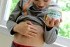 Kids can easily apply topical magnesium oil balm to their tummies themselves.
